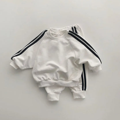 traje de bebé deportivo de dos piezas para niños