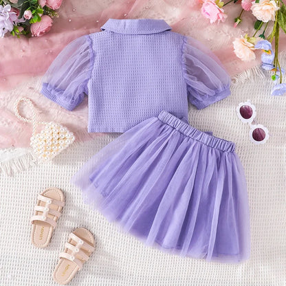 Blusa con botones y manga de encaje Falda de tul morada Traje de verano para niña