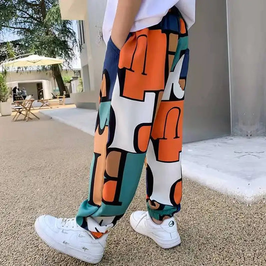 Pantalones deportivos con estampado de diseñador de graffiti